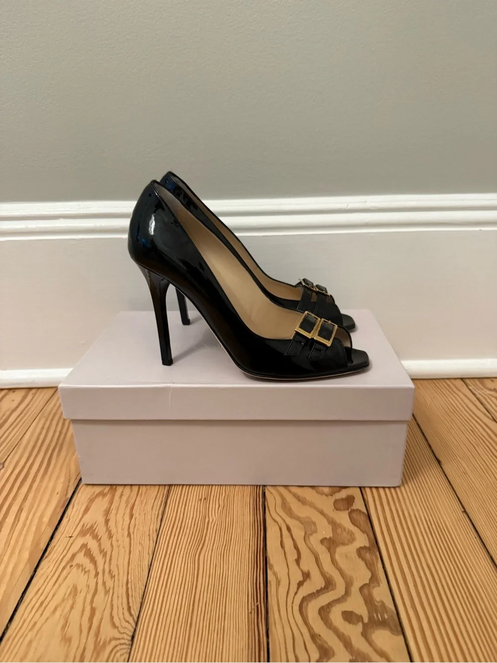Jimmy Choo Black Patent Leather Peep-Toe Pumps with Gold Buckles